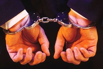 Felonies —Handcuffed Hands in Savannah, GA