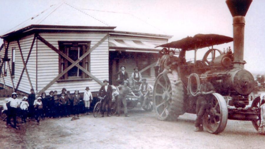 A black and white photo of a tractor with the number 10 on it