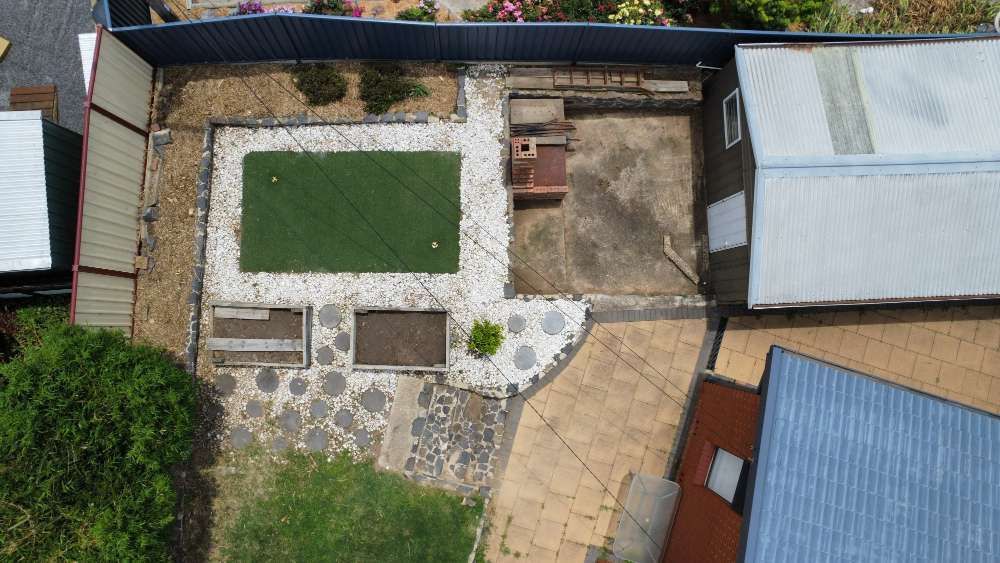 After An Aerial View Of A Backyard With A Pool And A House — Canberra Home and Garden Maintenance in Tuggeranong ACT