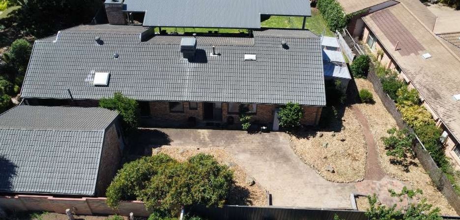 After An Aerial View Of A House With A Pool In The Backyard — Canberra Home and Garden Maintenance in Tuggeranong ACT