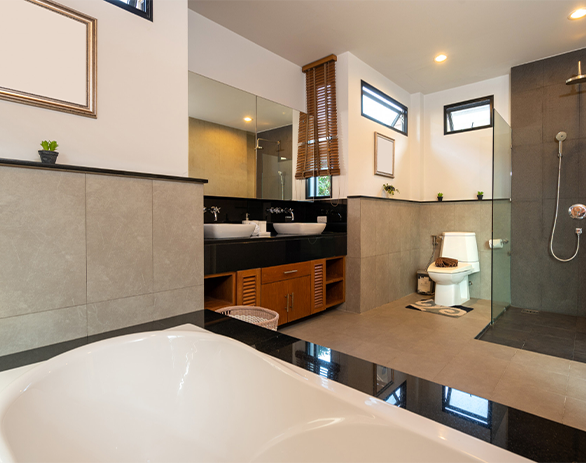 A kitchen with wooden cabinets and stainless steel appliances