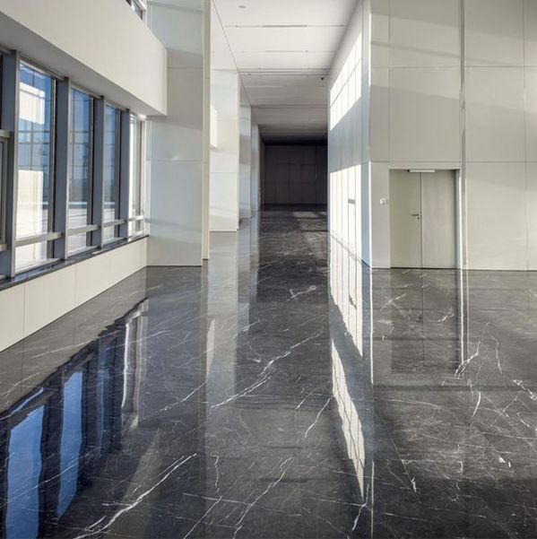 A kitchen with wooden cabinets and stainless steel appliances