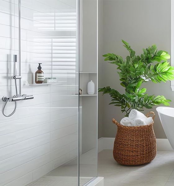 A bathroom with a bathtub and a mountain in the background