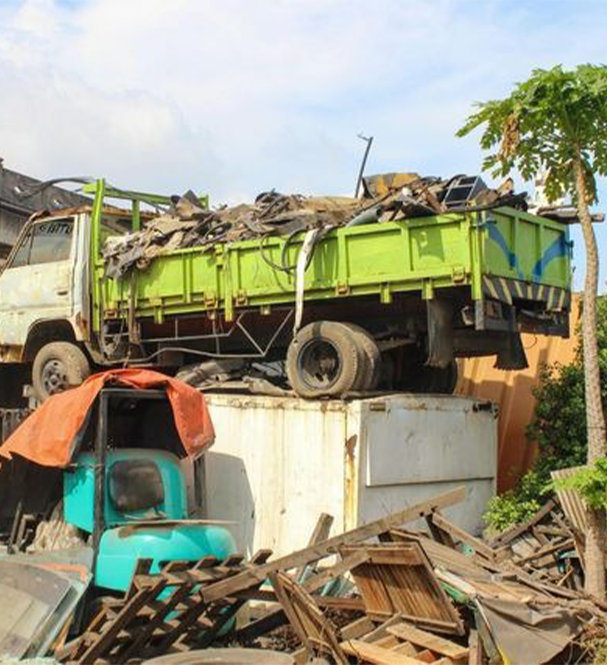 A kitchen with wooden cabinets and stainless steel appliances