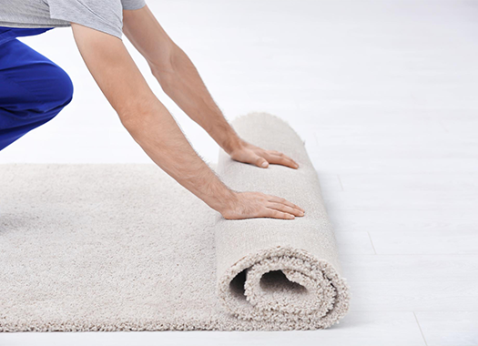 A kitchen with wooden cabinets and stainless steel appliances