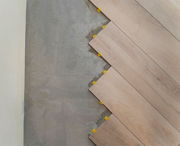 A kitchen with wooden cabinets and stainless steel appliances