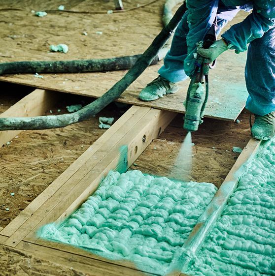 A kitchen with wooden cabinets and stainless steel appliances