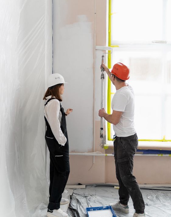 A kitchen with wooden cabinets and stainless steel appliances