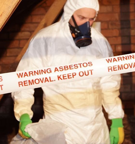 A kitchen with wooden cabinets and stainless steel appliances