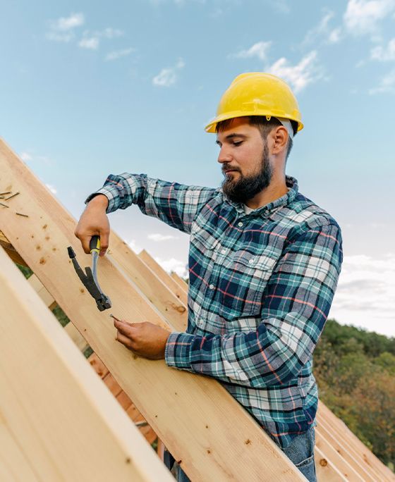 A kitchen with wooden cabinets and stainless steel appliances