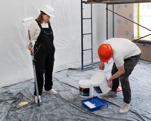 A kitchen with wooden cabinets and stainless steel appliances