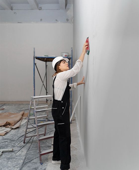 A kitchen with wooden cabinets and stainless steel appliances