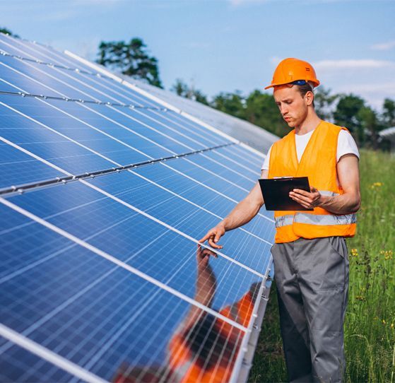A kitchen with wooden cabinets and stainless steel appliances