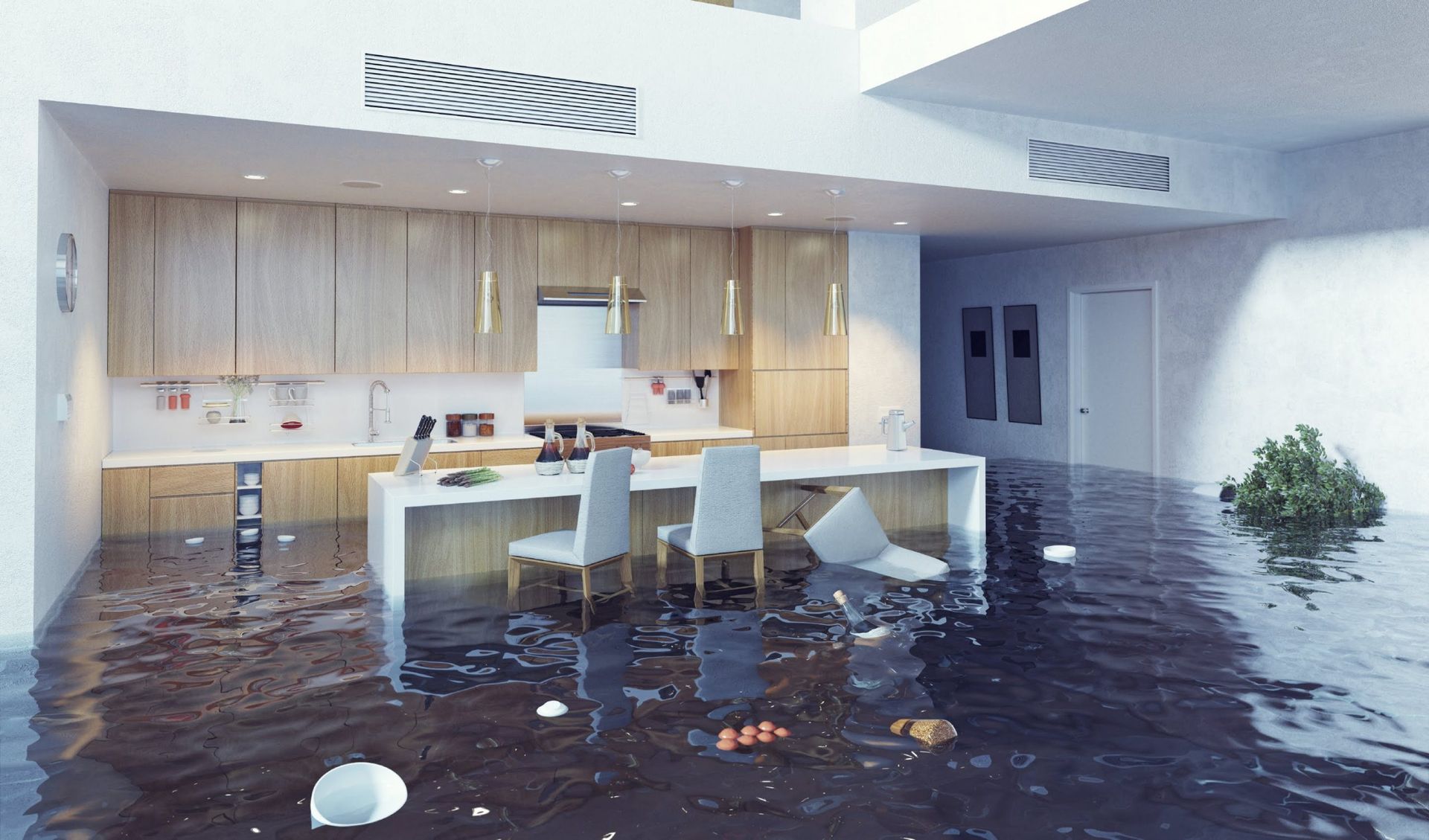 A kitchen and dining room are flooded Denver Colorado how to deal with water damage