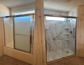 A bathroom with a walk in shower with sliding glass doors