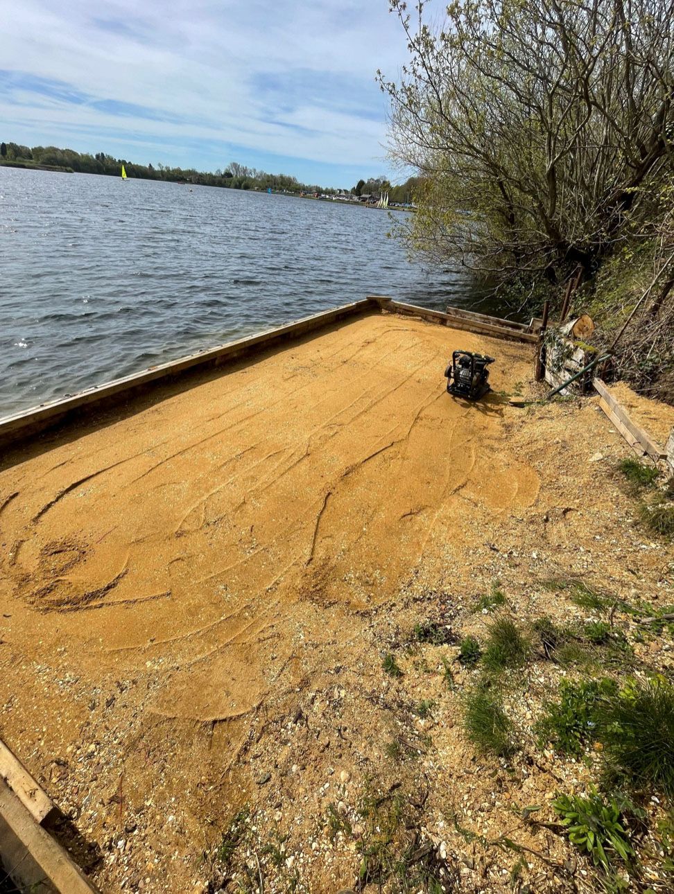 mini digger on hire digging out soakaway for local builder