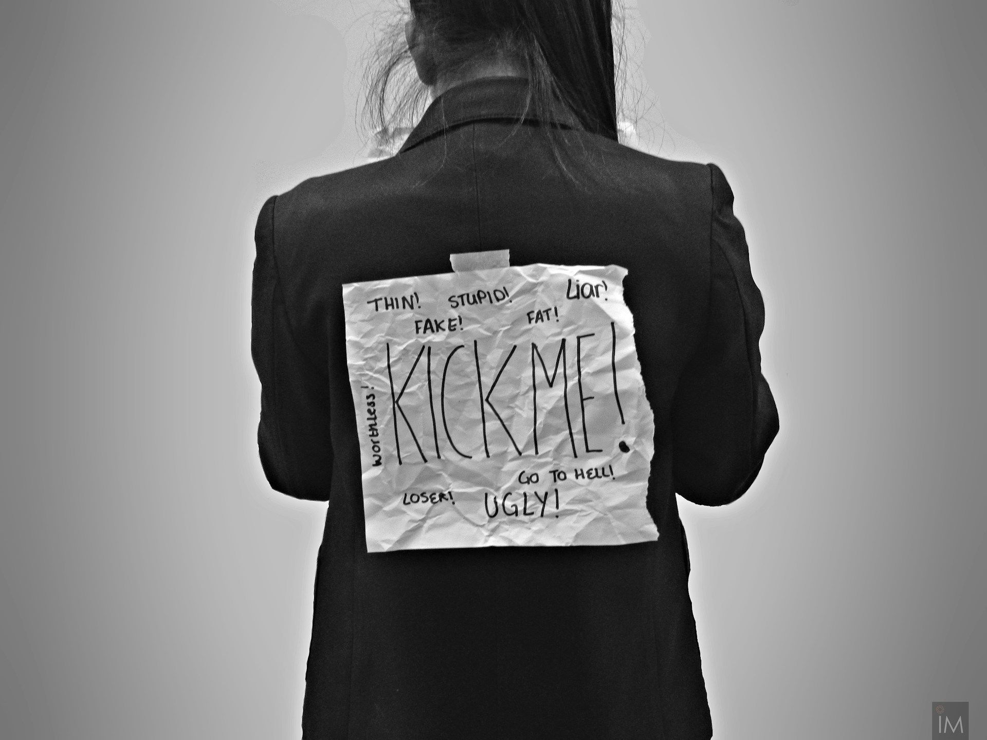 Person with a sign on their back