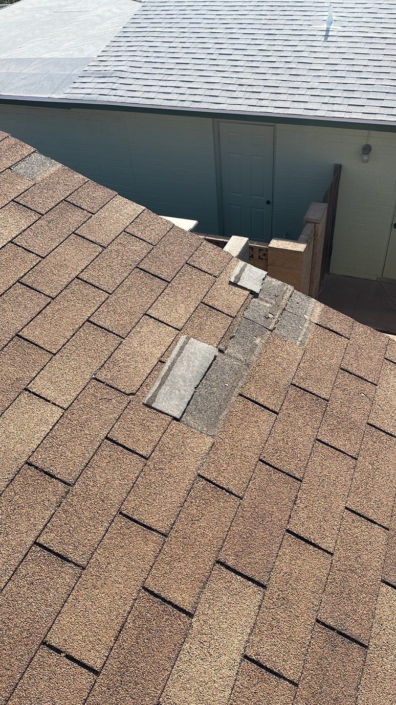 A close up of a roof with a hole in it.