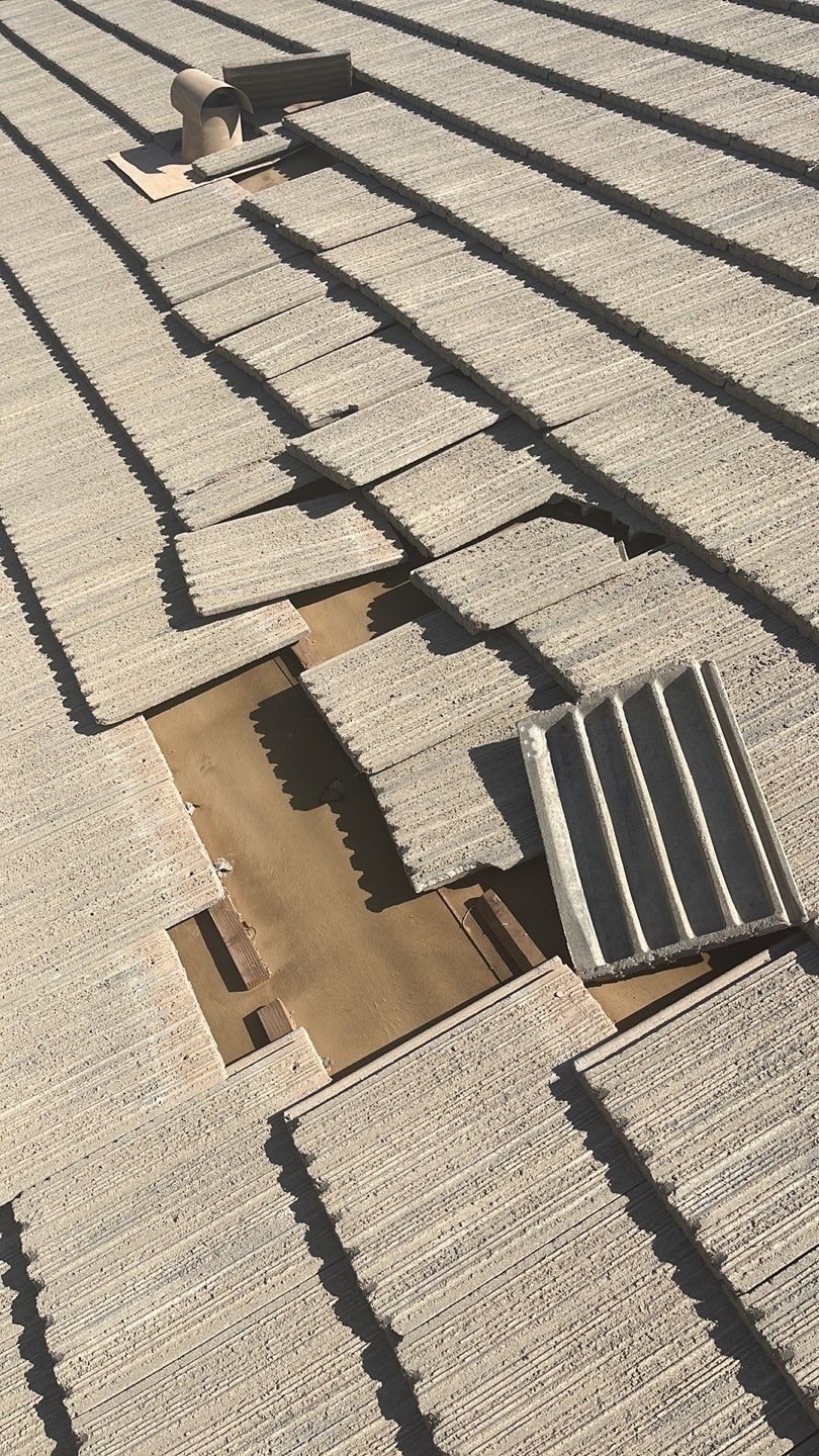 A close up of a roof with a hole in it.