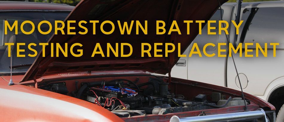 A red car with the hood open and the words moorestown battery testing and replacement | InTown Auto Care