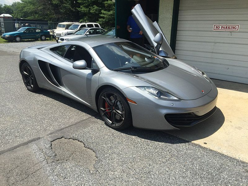 A Siler Sports Car with Opened Doors is Parked in the Parking Lot in Moorestown, NJ - InTown Auto Care
