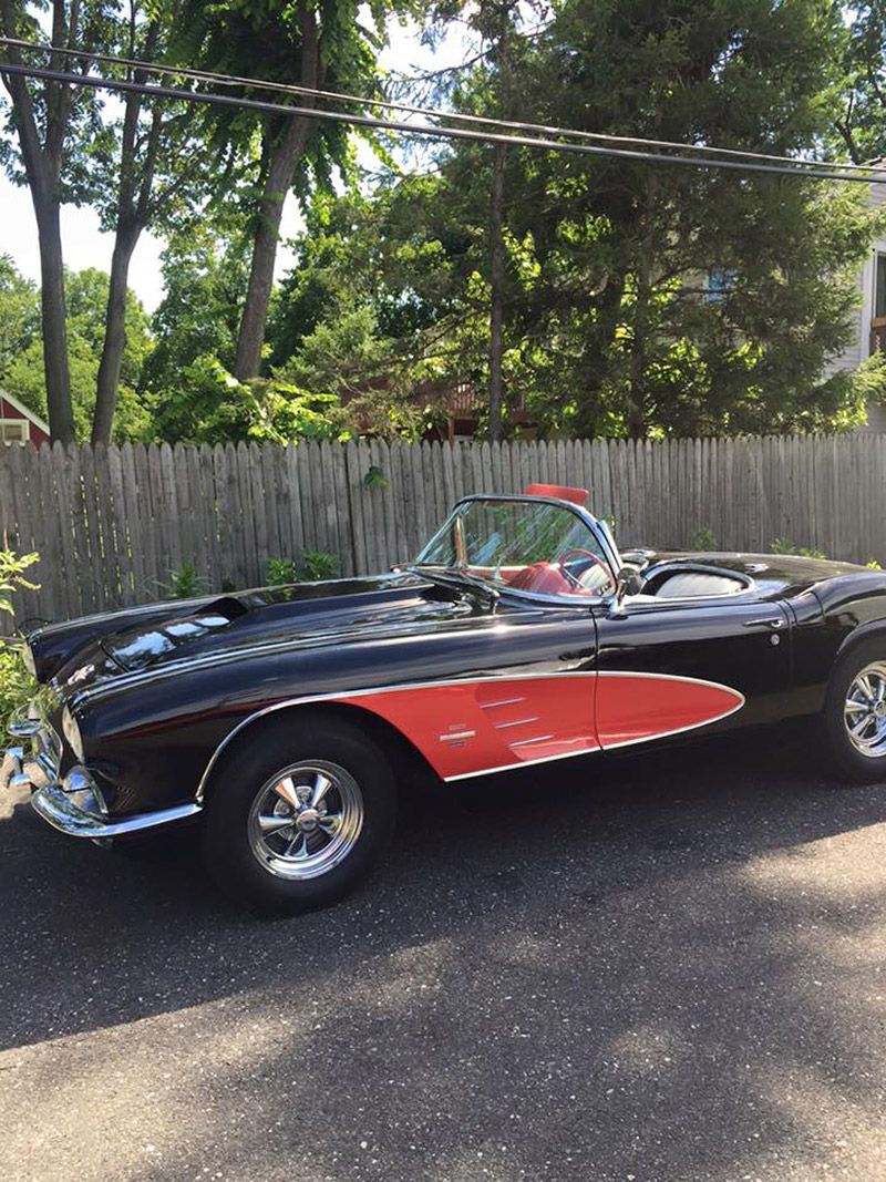 A Black Vintage Sport Vehicle is Parked Nearby InTown Auto Care in Moorestown, NJ