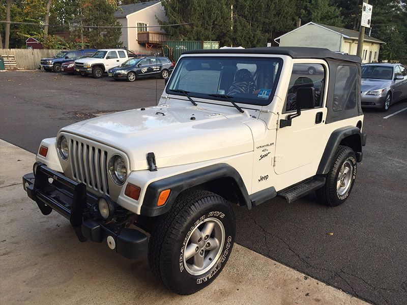 A White Jeep is Parked Nearby Our Service in Moorestown, NJ - InTown Auto Care