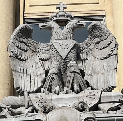 A statue of an eagle with the number 33 on it