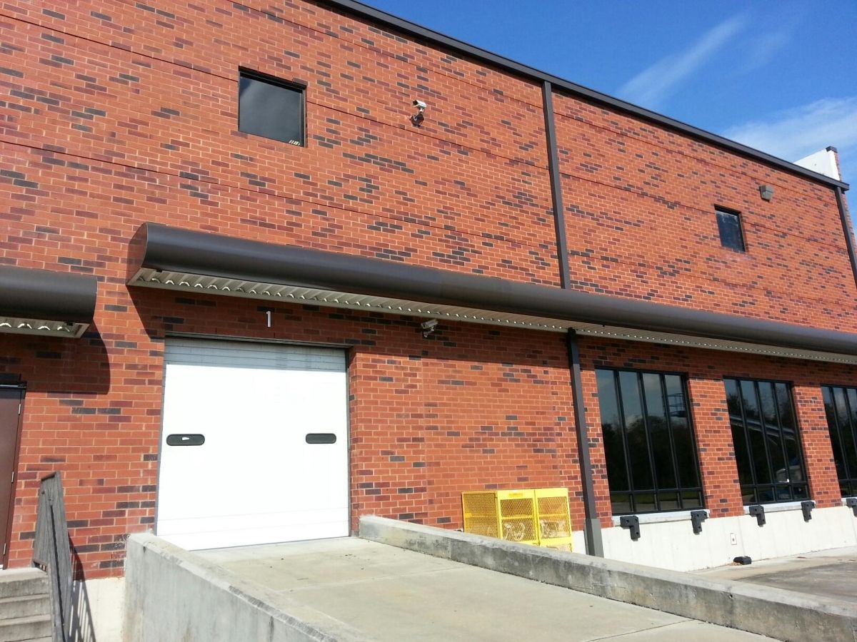 Metal Awning And Brick Wall - Jacksonville, FL - Boree Canvas Unlimited
