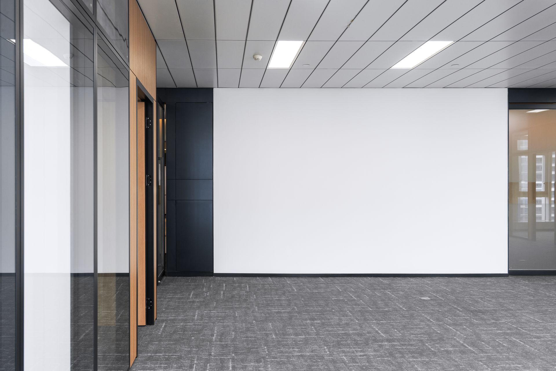 A family sits on the porch of their house with their dog