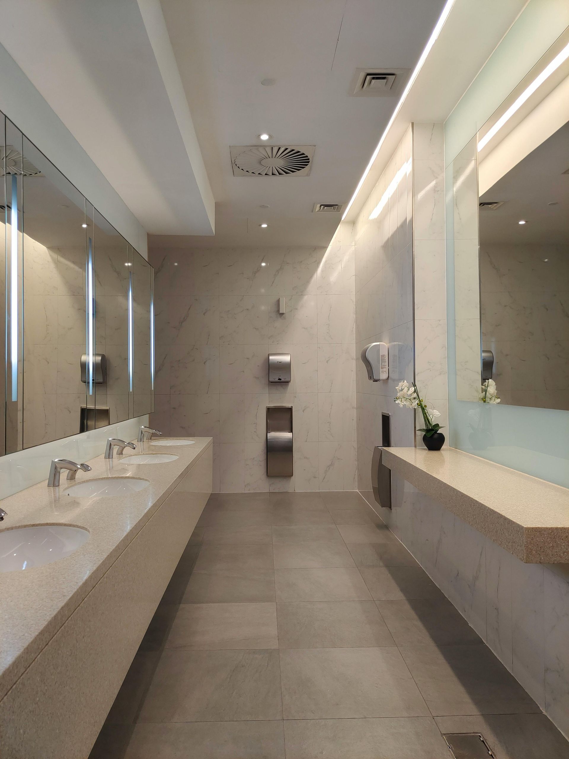 Commercial restroom remodel showcasing modern design and professional fixtures