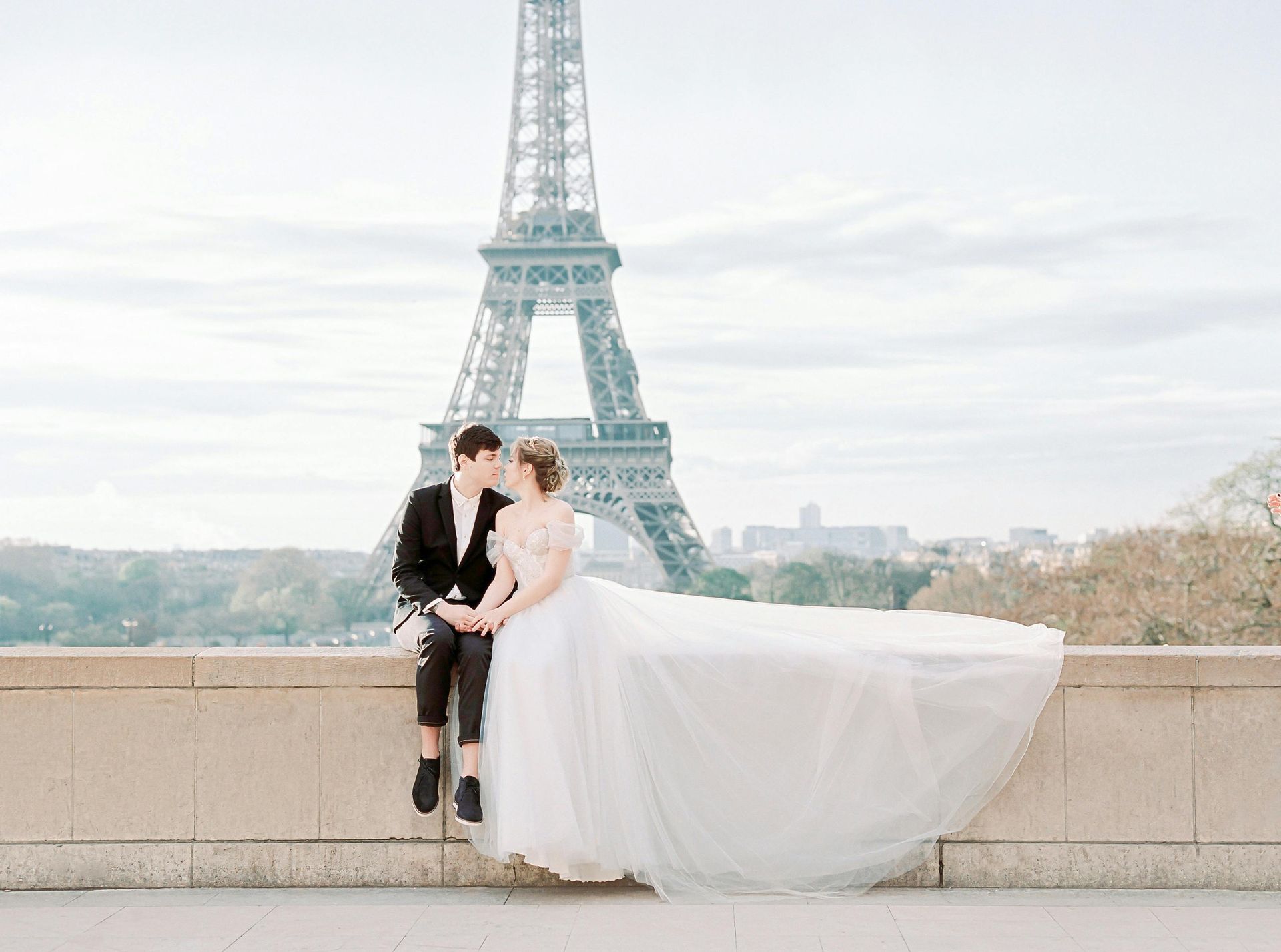 Want your picture in front of the Eiffle Tower? We can make that happen
