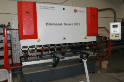 A diamond smart machine is sitting in a warehouse