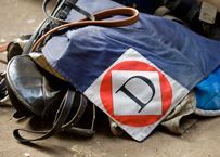 Horse saddle and tack, with a diamond-shaped patch bearing a 