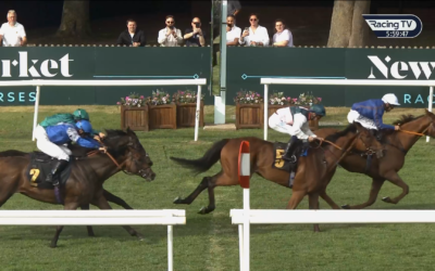 Horses racing toward the finish line at Newmarket. Jockey in blue, number 5, and jockey in green, number 7.