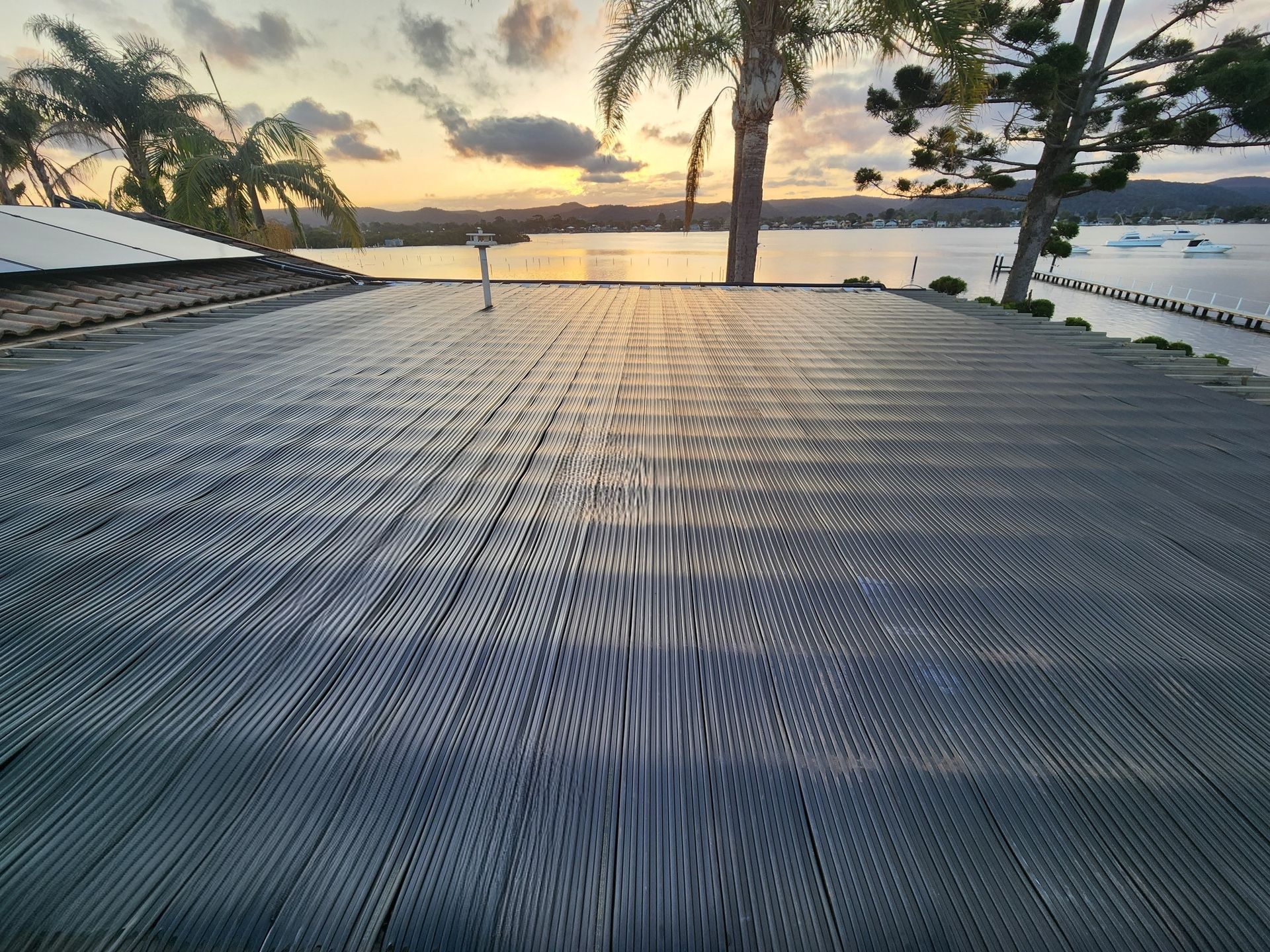 A Roof With a Lot of Solar Panels on It — Solar Services in Gosford, NSW