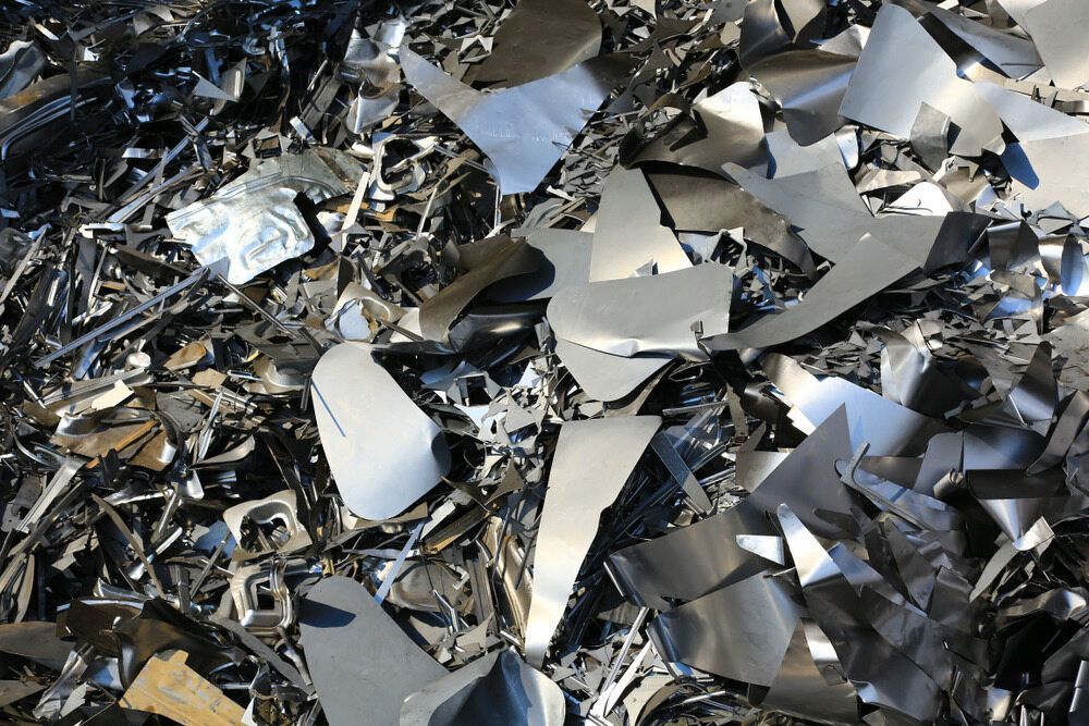 Scrap Metal Pieces, Shiny and Irregular Shapes, in a Pile — Hasti Skips in Murwillumbah, NSW
