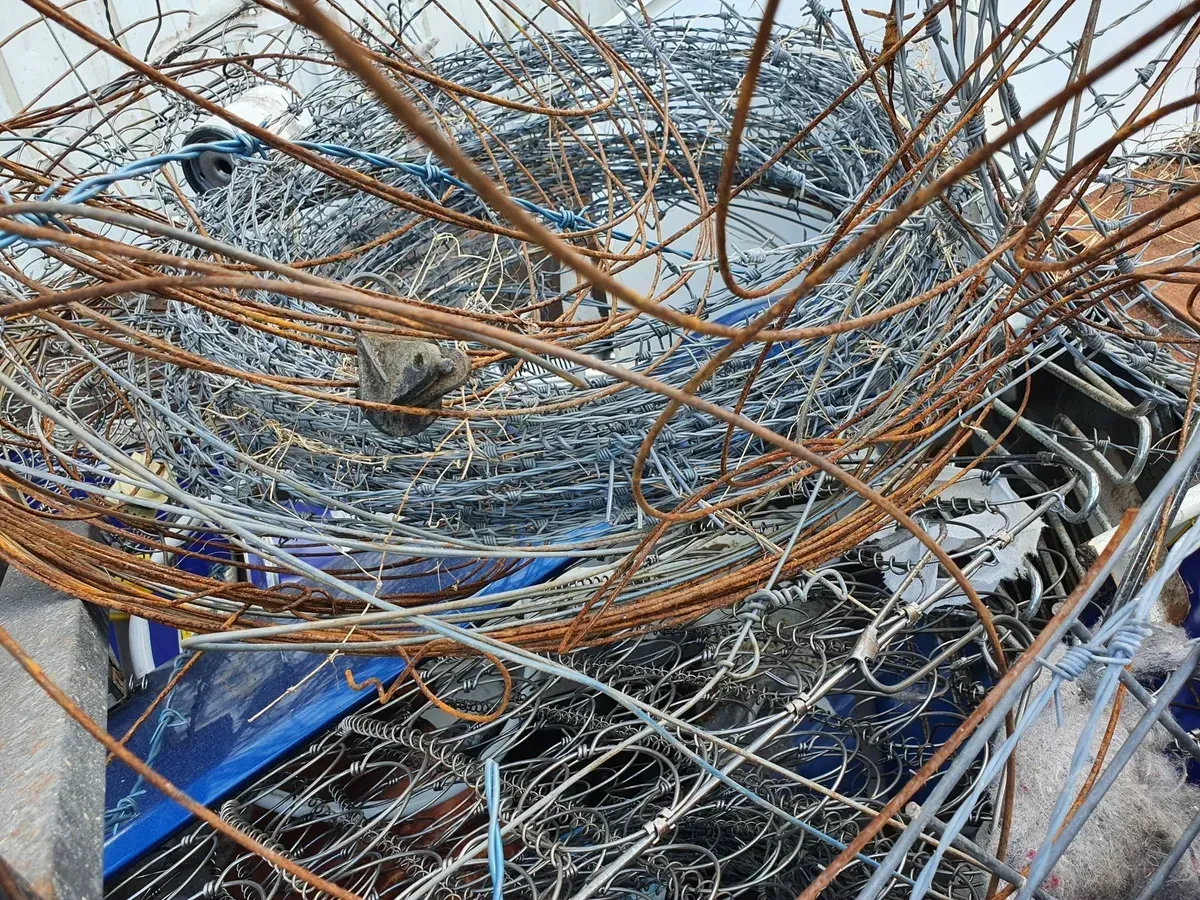 A close up of a pile of wire and rubbish — Hasti Skips in Bangalow, NSW