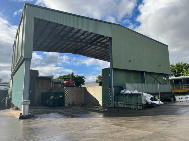 A large green building for dumping piles of rubbish — Hasti Skips in Bangalow, NSW