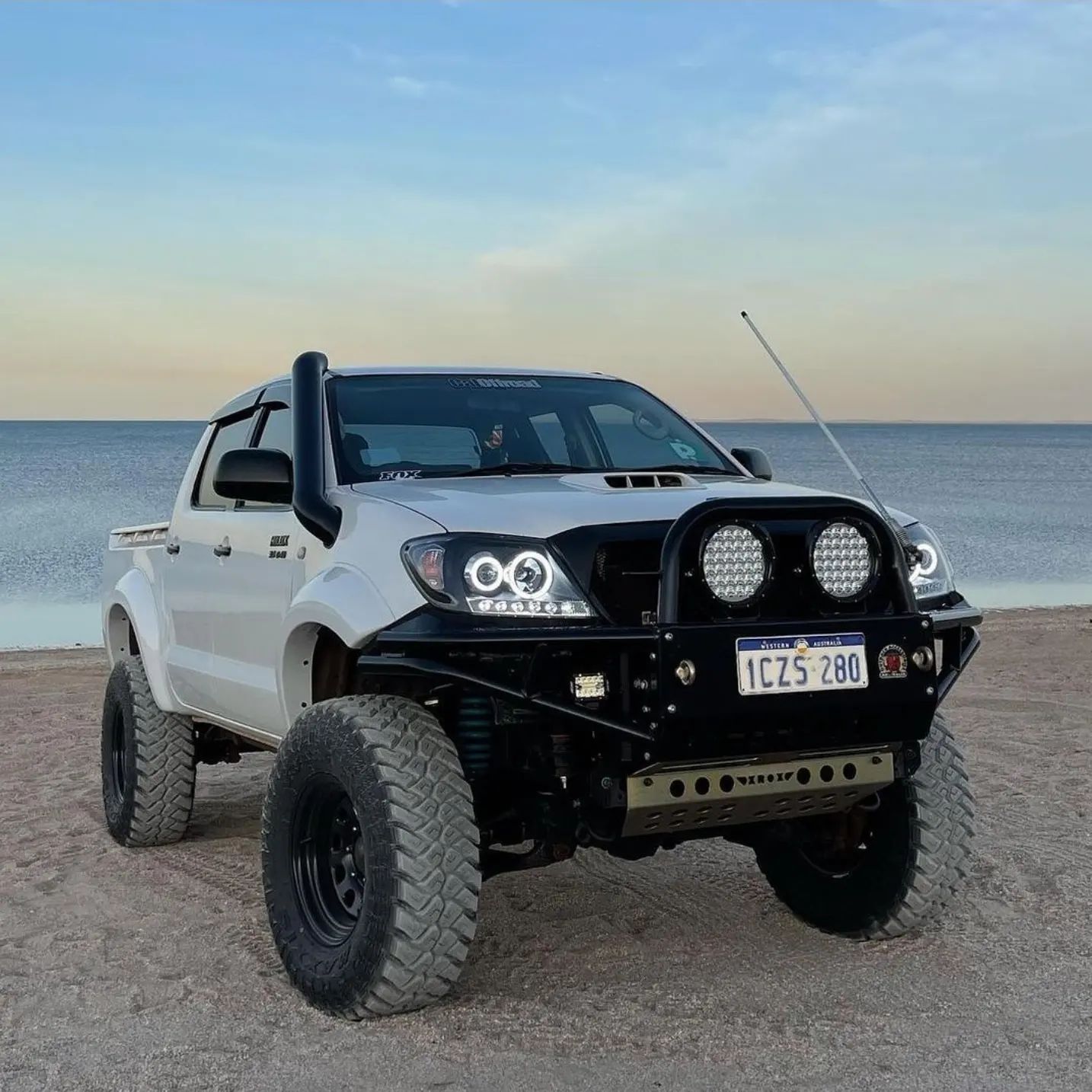 A poster for maxxis razr mt772 and razr at811 tires.