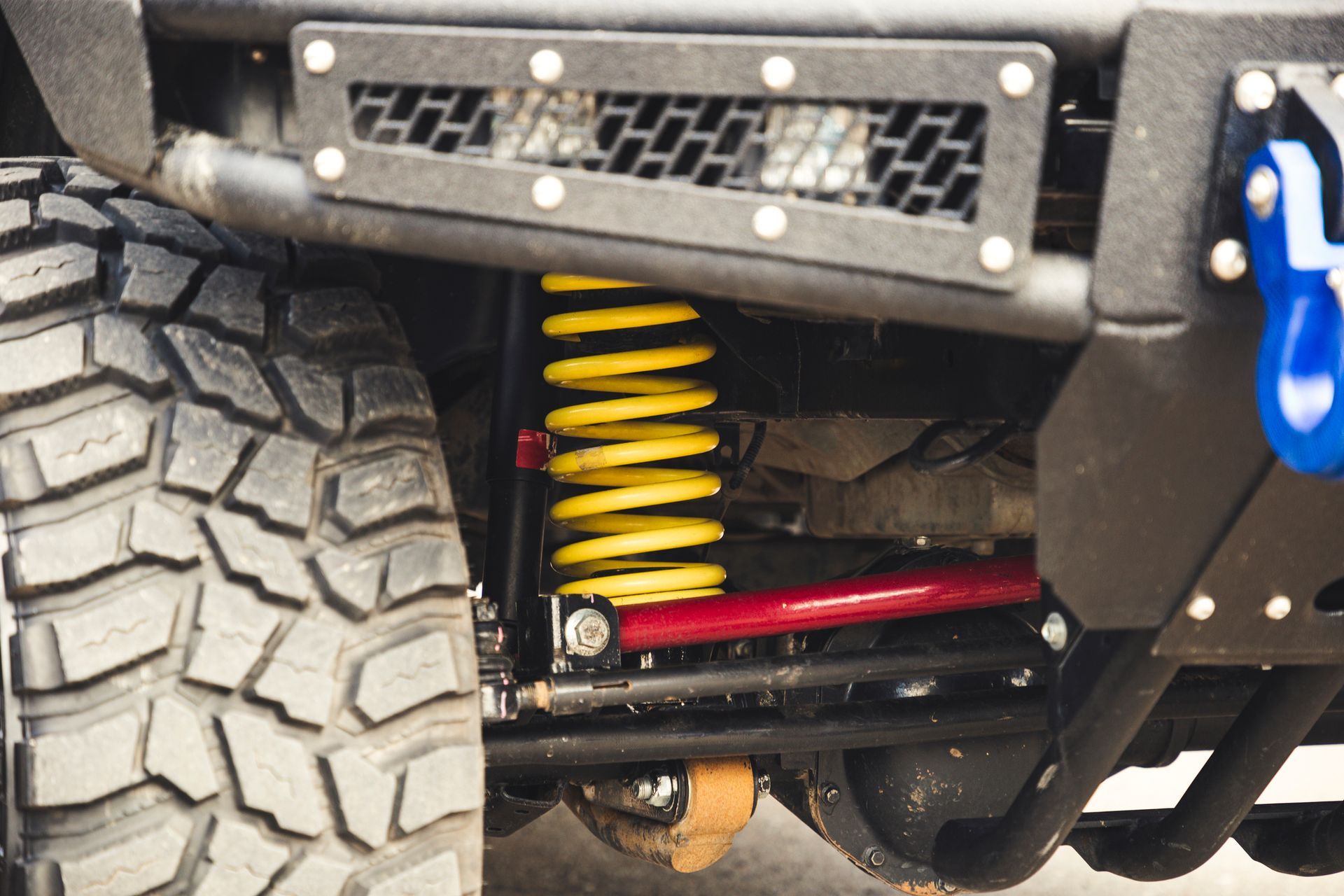 Big yellow off-road lift kit on a 4X4.