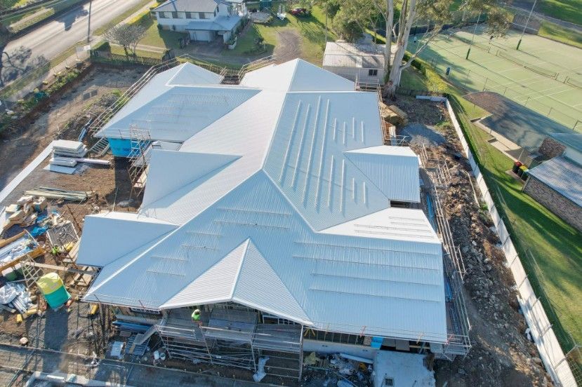 Aerial View of a Building Under Construction — Southern Cross Roof Plumbing in Tregeagle, NSW