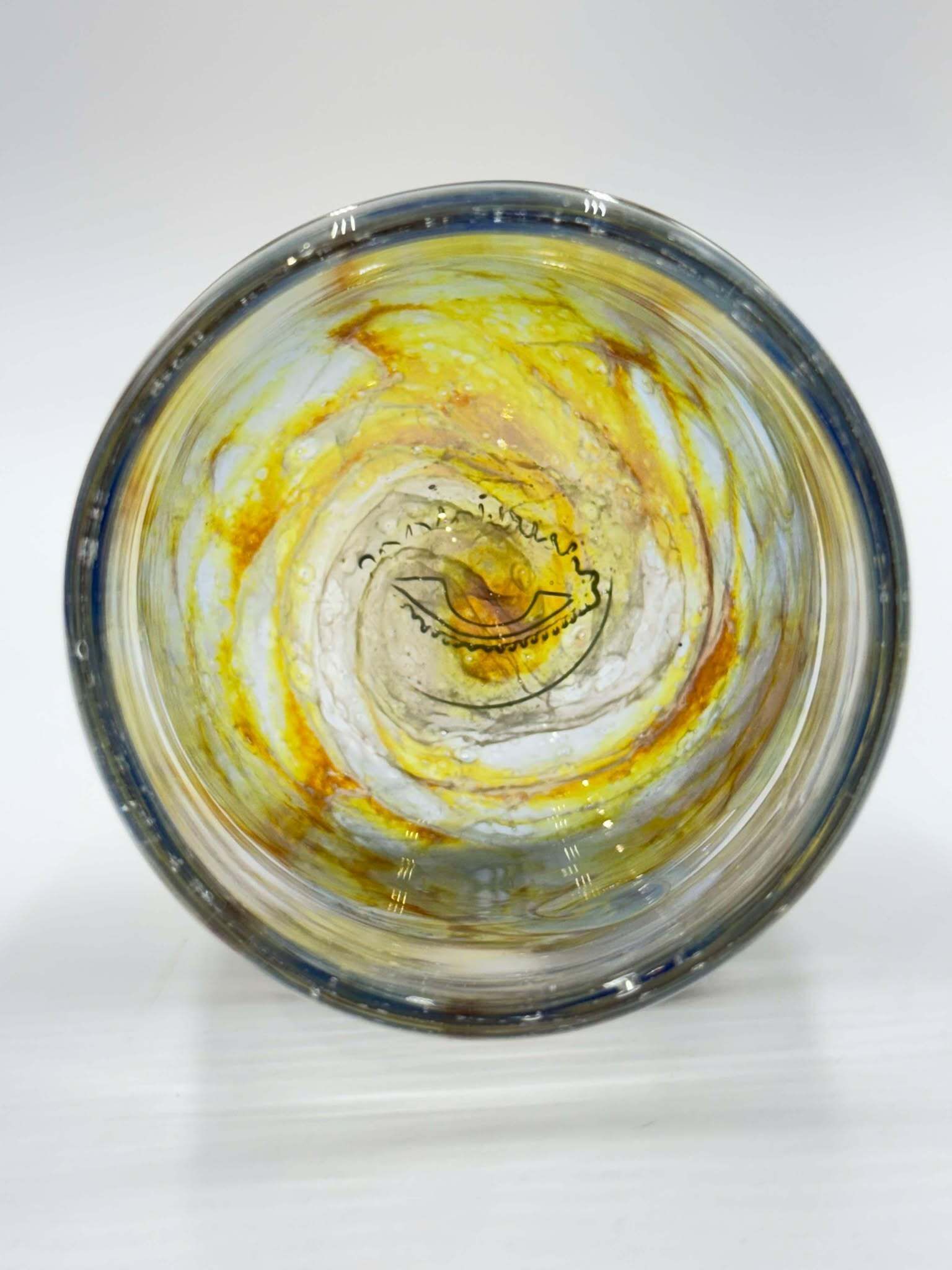 An image of the inside of a sipper handblown glass by the artist Alice Donut.