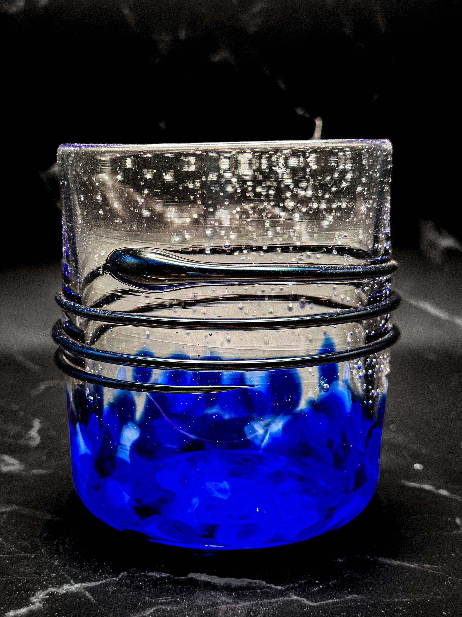 A Blue Custom Blown Whiskey or Drinking Glass
