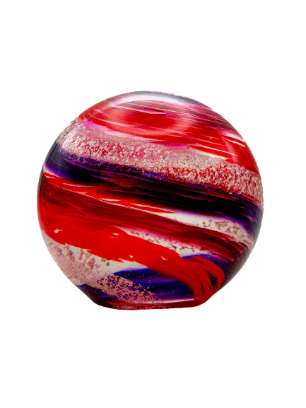 A red , purple and white glass ball on a white background