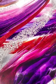 A close up of a purple and red painting on a wall.