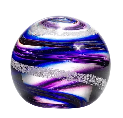 A purple and blue glass ball with a star in the middle