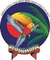 Volkman bird seed logo: parrot in flight, tropical setting, with text