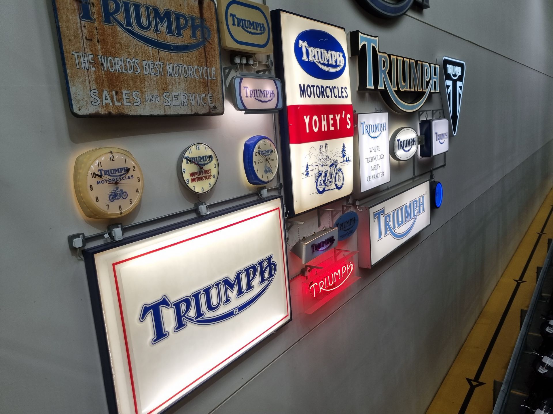 Old Triumph dealer signs