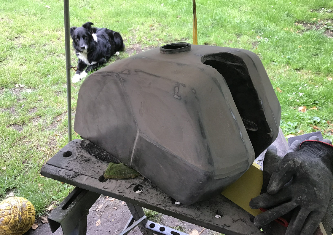 Filling and sanding dirt bike fuel tank